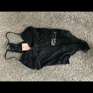 Black crochet racer back body suit